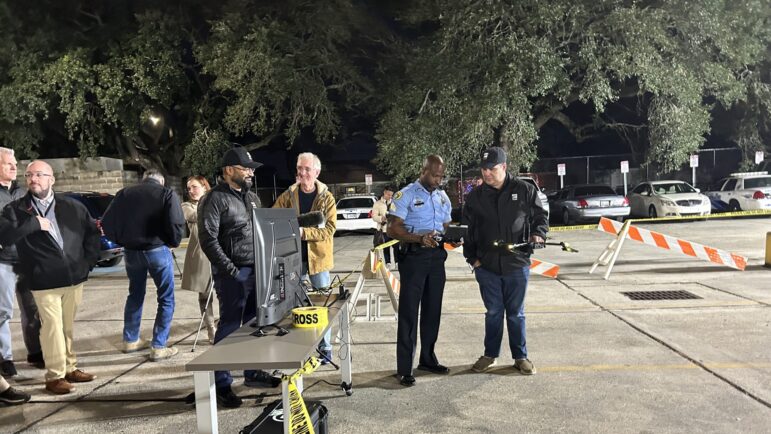 New Orleans Police Department officers prepare to fly a drone at a public demonstration on Nov. 28, 2023.