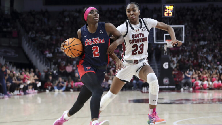 Mississippi guard Marquesha Davis (2) drives past South Carolina guard Bree Hall (23) during the first half of an NCAA college basketball game Sunday, Feb. 4, 2024, in Columbia, S.C. (AP Photo/Artie Walker Jr.)