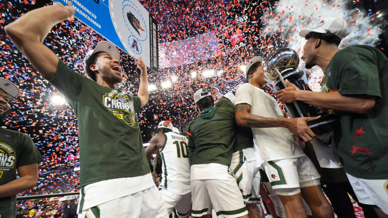 UAB's Seth Sigmon, left, reacts as teammates celebrate after defeating Temple during an NCAA college basketball game in the championship of the American Athletic Conference tournament, Sunday, March 17, 2024, in Fort Worth, Texas. UAB won 85-69.