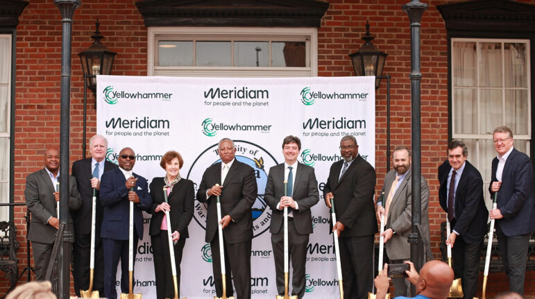 Officials with Meridiam and the City of Selma pose at the ground breaking for a $230 million broadband internet project on March, 2, 2024, in Selma, Alabama.