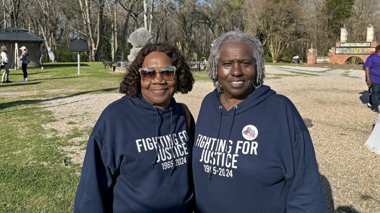 Sisters Denise Jarnigan-Holt (left) and Alice Moore (right) pose for a photo before the Selma Jubilee March for Voting Rights in Selma, Alabama, on March 3, 2024.
