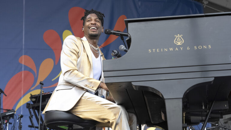 Jon Batiste performs during the New Orleans Jazz & Heritage Festival on Friday, April 26, 2024, at the Fair Grounds Race Course in New Orleans.