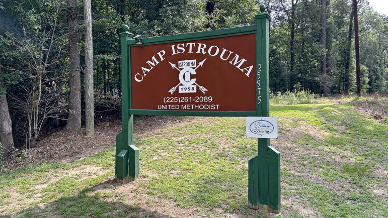 The entrance sign for Camp Istrouma, a sleepaway summer camp in Greenwell Springs, Louisiana, on June 12, 2024.