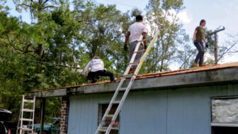 In this contributed photo, volunteers help rebuild a home that sustained damage from Hurricane Laura in DeQuincy, Louisiana.