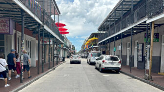 Bourbon Street in New Orleans is hot and quiet just after 1 p.m. on June 26, 2024.