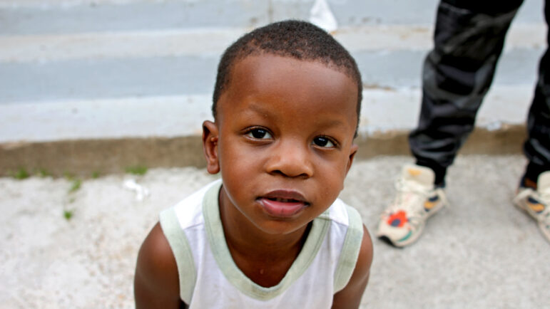 Carl Law’s son Blaze poses for a photo in the Lakeside neighborhood of Shreveport, Louisiana, on April 18, 2024.