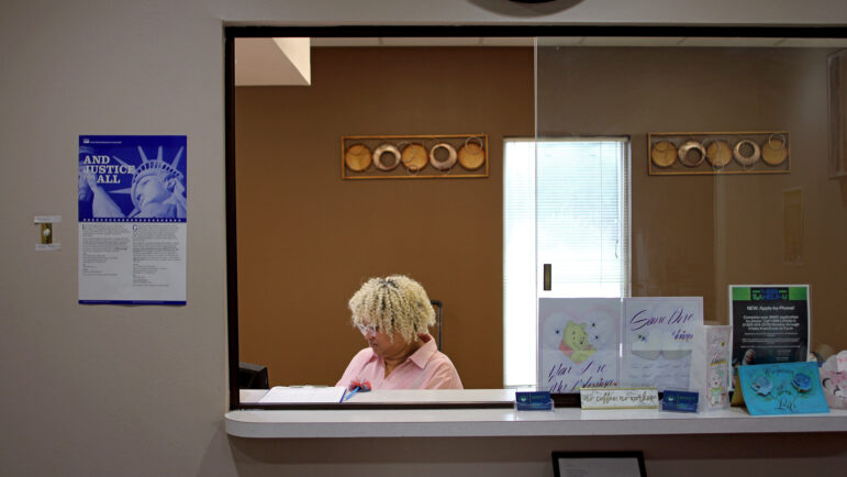 Social worker Vanessa Smith sits at the front desk of Compassion for Lives in Shreveport, Louisiana, on April 18, 2024.