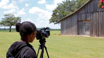 Akeelah Phillips films the seed barn during the Mississippi Delta Film Academy’s trip to Drew, Mississippi, on June 21, 2024.
