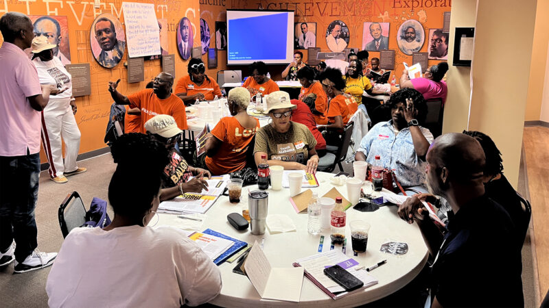 C.J. and Letetia Jackson lead a group in a improv activity in Dothan, Alabama, on July 13, 2024.