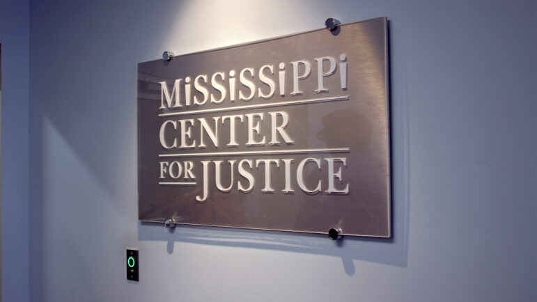 A sign hangs in Mississippi Center for Justice's Jackson office on June 11, 2024.