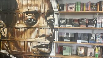 James Baldwin's face is painted on a decorative bookcase inside the Baldwin & Co. bookstore in New Orleans.