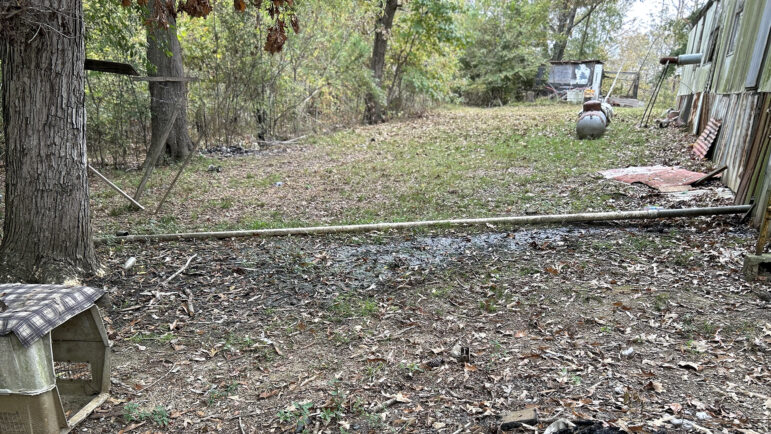 A pipe leads out of Willie and Thelma Perryman’s manufactured house into the woods on Wednesday, October 30, 2024, in Letohatchee, Alabama.