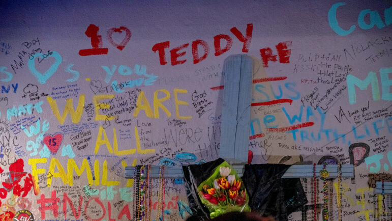 Handwritten messages of support and remembrance decorate the wall of a building near the intersection of Bourbon and Canal streets in New Orleans on Saturday, Jan. 4, 2025.