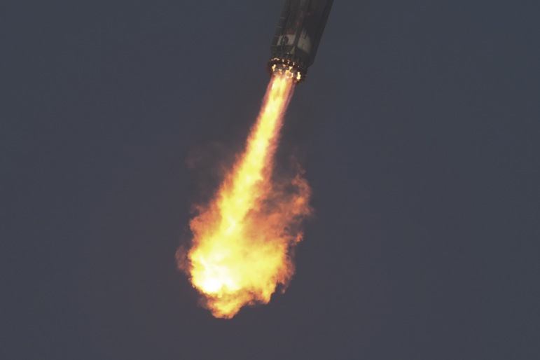 The booster of SpaceX's mega rocket Starship is recaptured during a test flight from Starbase in Boca Chica, Texas, on Thursday.