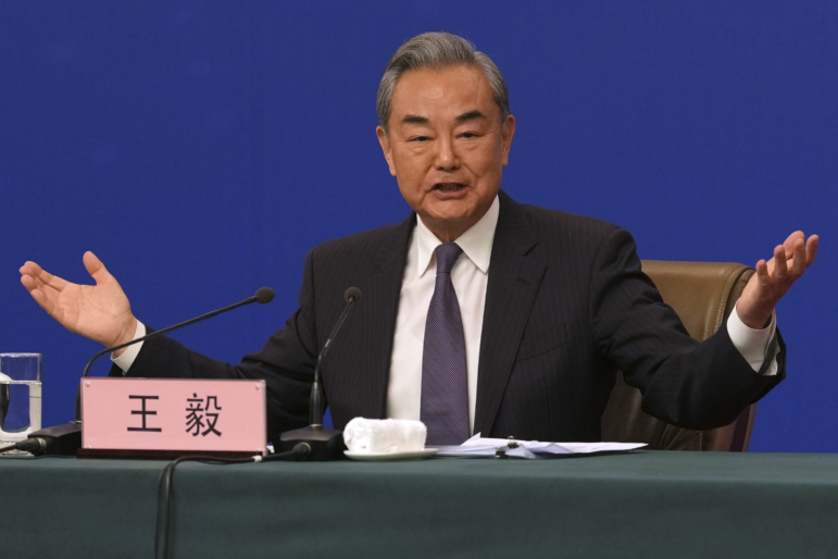 Chinese Foreign Minister Wang Yi speaks during a press conference on the sideline of the National People's Congress in Beijing on Friday.