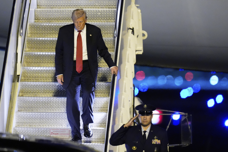 President Donald Trump arrives on Air Force One at Palm Beach International Airport, Friday, March 14, 2025, in West Palm Beach, Fla.