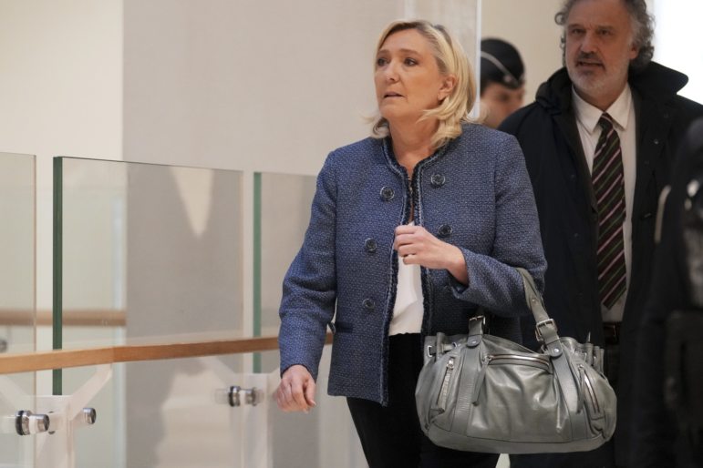 French far-right leader Marine Le Pen arrives at a Paris court expected to deliver a verdict in an embezzlement case that could shake up French politics and derail far-right leader Marine Le Pen's career Monday, March 31, 2025 in Paris.