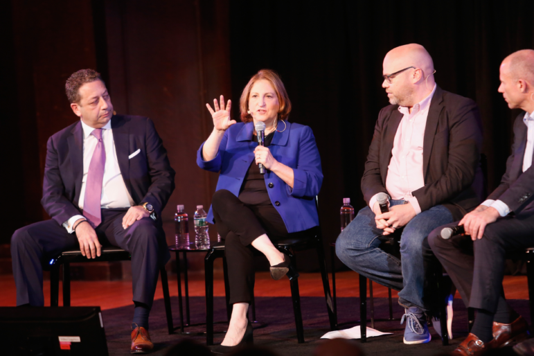 Washington Post columnist Ruth Marcus (in a blue jacket) speaks on stage during a panel at the New Yorker Festival in 2018. (Photo by Thos Robinson/Getty Images for The New Yorker)