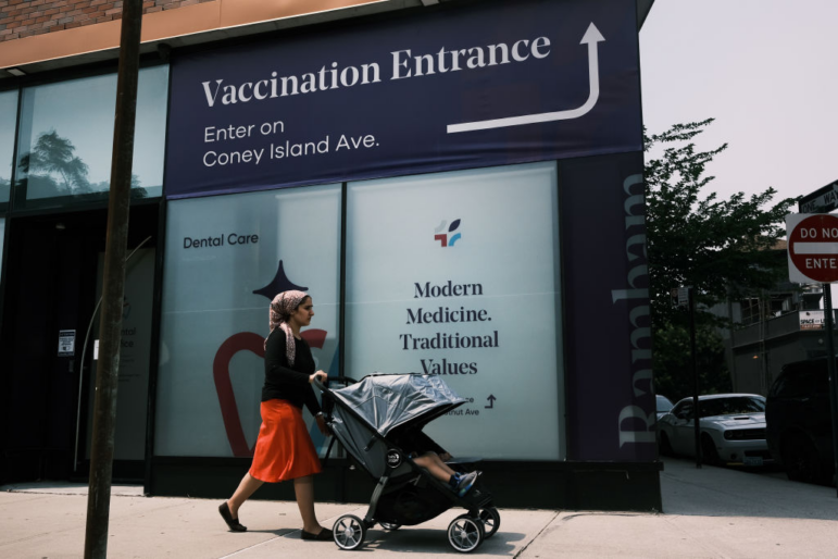 NEW YORK CITY - JULY 26: A doctors office advertises the Covid-19 vaccine in a neighborhood near Brighton Beach on July 26, 2021 in the Brooklyn borough of New York City. Due to the rapidly spreading Delta variant, New York City Mayor Bill de Blasio has announced that the city will require all city workers to be vaccinated or tested weekly for COVID-19. (Photo by Spencer Platt/Getty Images)