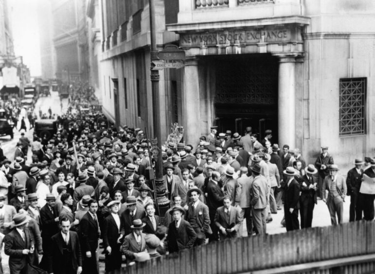 Crowds outside the New York Stock Exchange during the Wall Street Crash in the Financial District of Lower Manhattan, New York City, New York, Oct. 1929.