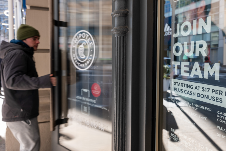 U.S. employers continued to add jobs last month, but layoff notices have also increased to their highest level since the early months of the pandemic.
