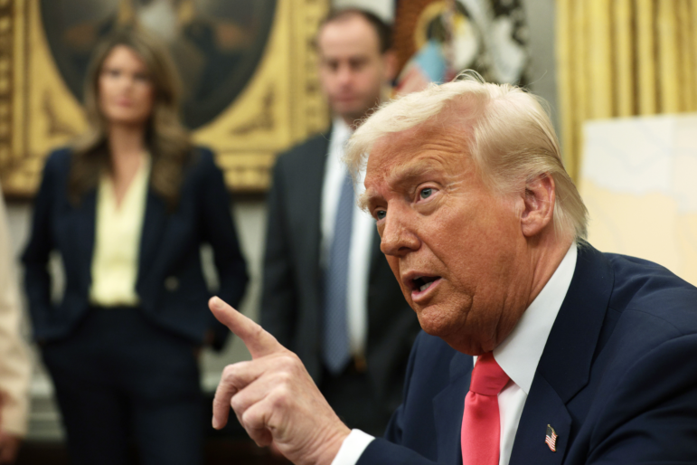President Trump speaks after signing executive orders in the Oval Office of the White House on March 06, 2025 in Washington, D.C., including one to lift 25% tariffs for all goods compliant under USMCA trade agreement.