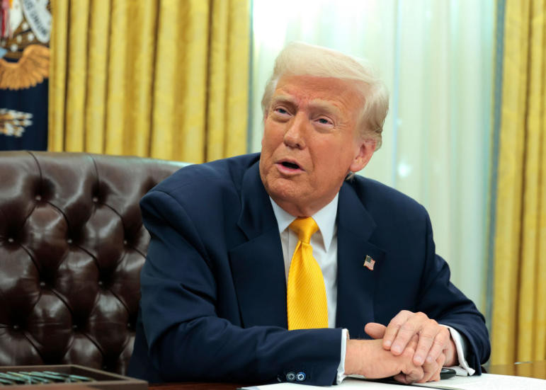 President Trump speaks before signing an executive order in the Oval Office at the White House on March 7.