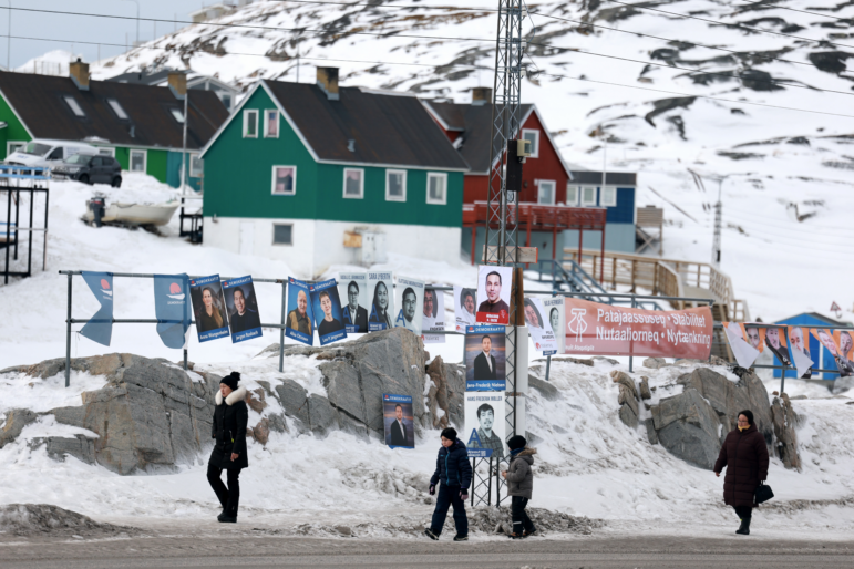 Campaign posters hang outside a polling station ahead of Greenland's March 11 election, in Ilulissat, Greenland. The island will elect the 31 members of its parliament, called the Inatsisartut. Greenland was due to hold elections by April 6, but Prime Minister Mute Egede called for an early vote amid the geopolitical tensions stoked by President Trump's vow to take control of the autonomous Danish territory.