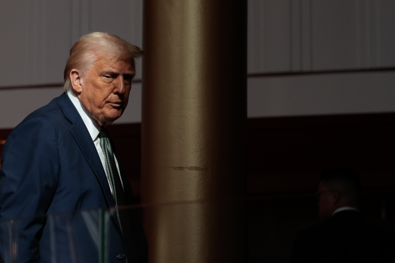 President Trump departs after speaking with reporters in the Grand Foyer during a tour at the John F. Kennedy Center for the Performing Arts on Monday.