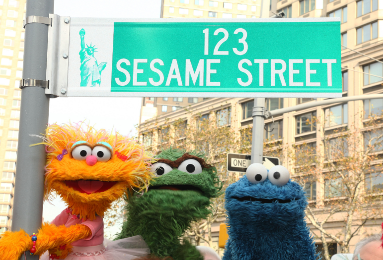 Sesame Street characters pose under a "123 Sesame Street" sign at the "Sesame Street" 40th Anniversary temporary street renaming in Dante Park on November 9, 2009 in New York City. (Photo by Astrid Stawiarz/Getty Images)