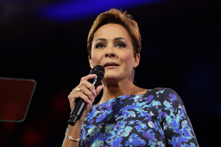 Kari Lake, U.S. President Donald Trump's choice to lead Voice of America, is shown speaking at the Conservative Political Action Conference (CPAC) at the Gaylord National Resort Hotel And Convention Center on Feb. 21, 2025 in Oxon Hill, Maryland.