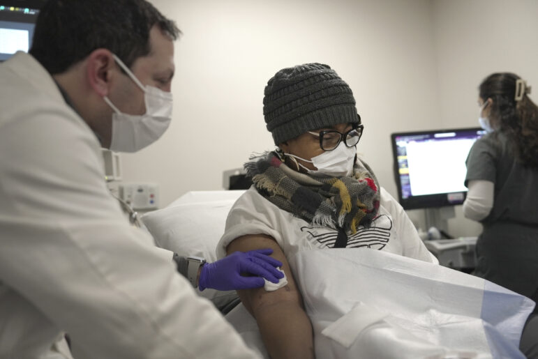 Towana Looney, a pig kidney transplant recipient, gets a morning check-up with Dr. Jeffrey Stern at NYU Langone Health in New York