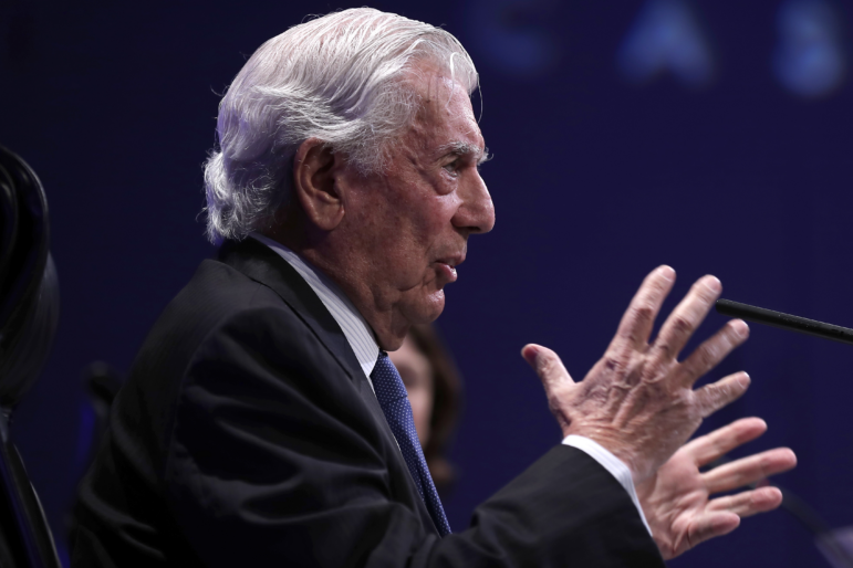 Mario Vargas Llosa addresses to the media during a news conference and presentation of his new book 'Tiempos recios' in Madrid, Spain, in 2019.