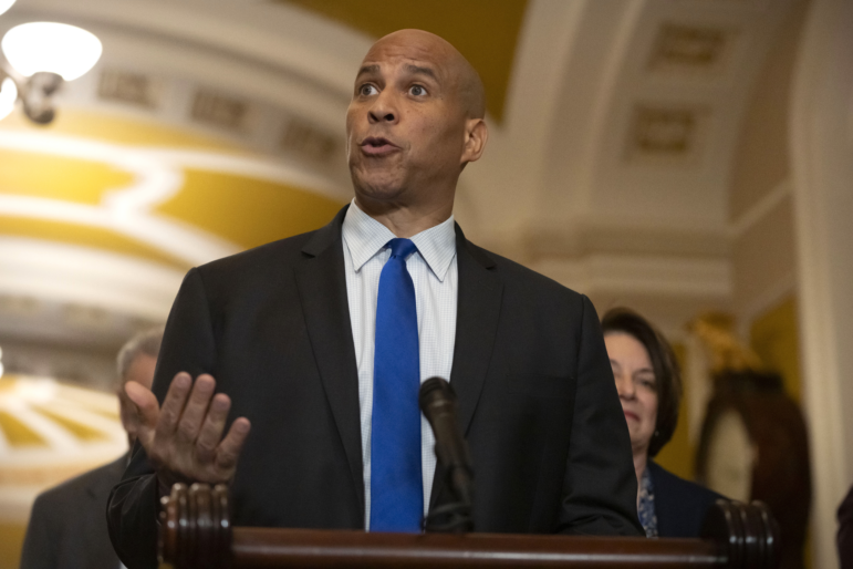 Sen. Cory Booker, D-N.J., speaks to reporters in the Capitol.