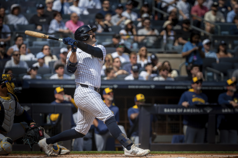 Austin Wells of the New York Yankees hits a home run in the first inning of the Yankees' game against the Milwaukee Brewers on March 29. The Yankees went on to win 20-9. Wells was using what some have dubbed a "torpedo bat."