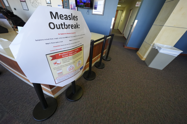 A measles sign is seen at the Texas Tech University Health Sciences Center, Feb. 25, 2025, in Lubbock, Texas.