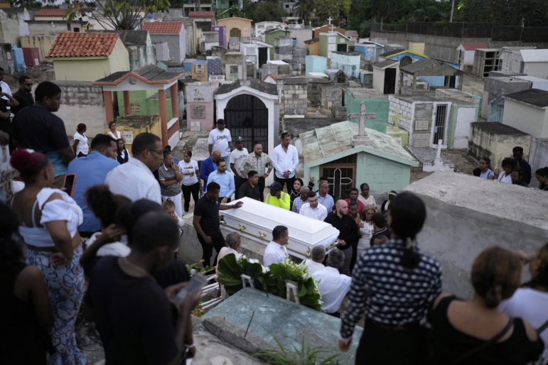 Family and friends attend the funeral of Marilenny Pilarte who died at the Jet Set nightclub when its roof collapsed, in Haina, Dominican Republic on Thursday.