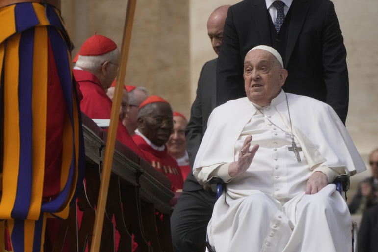 Pope Francis arrives at the end of the mass on Palm Sunday in St. Peter's Square at The Vatican, Sunday, April 13, 2025.
