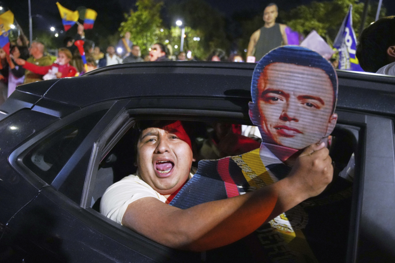 Supporters of President Daniel Noboa celebrate early returns showing him in the lead in the presidential election runoff in Quito, Ecuador, Sunday, April 13, 2025.
