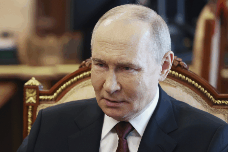 Russian President Vladimir Putin speaks with Russian Chief of General Staff Gen. Valery Gerasimov during their meeting at the Kremlin in Moscow on Saturday.
