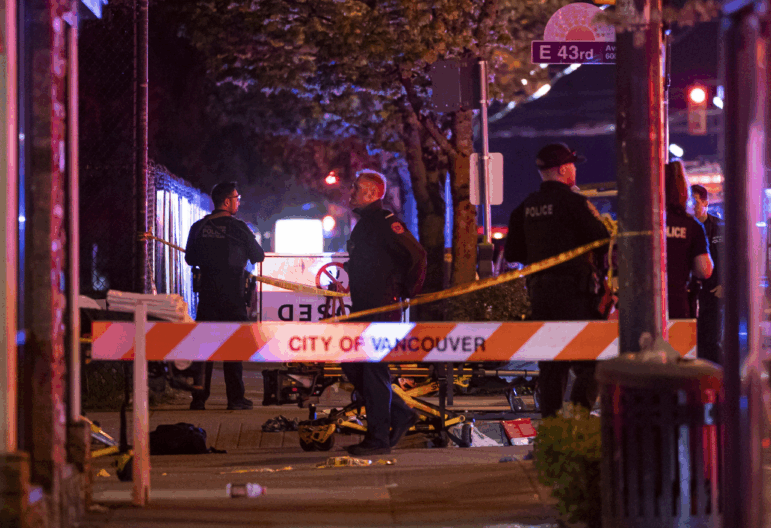 Vancouver police secure the scene after a car drove into a crowd at the Lapu Lapu Festival in Vancouver, British Columbia on Saturday.