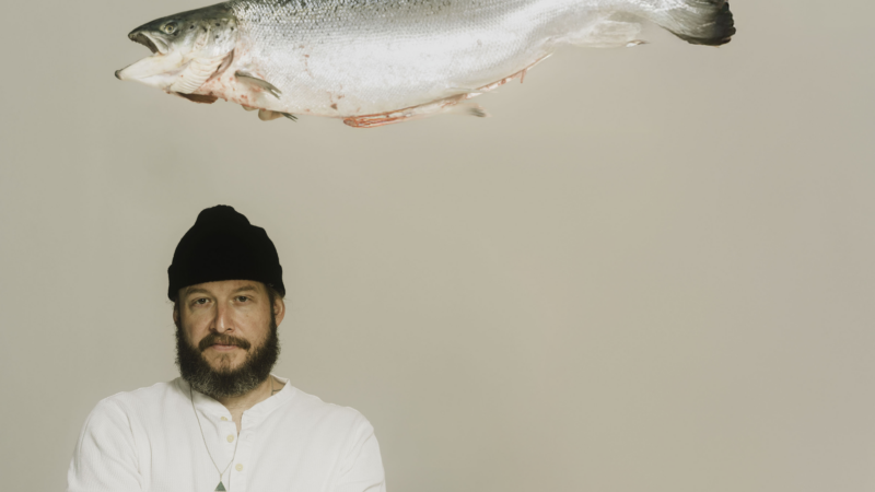 https://wbhm.org/wp-content/uploads/2025/04/bon-iver-by-graham-tolbert-if-only-i-could-wait-b-w-walk-home-photo-3-800x450.png