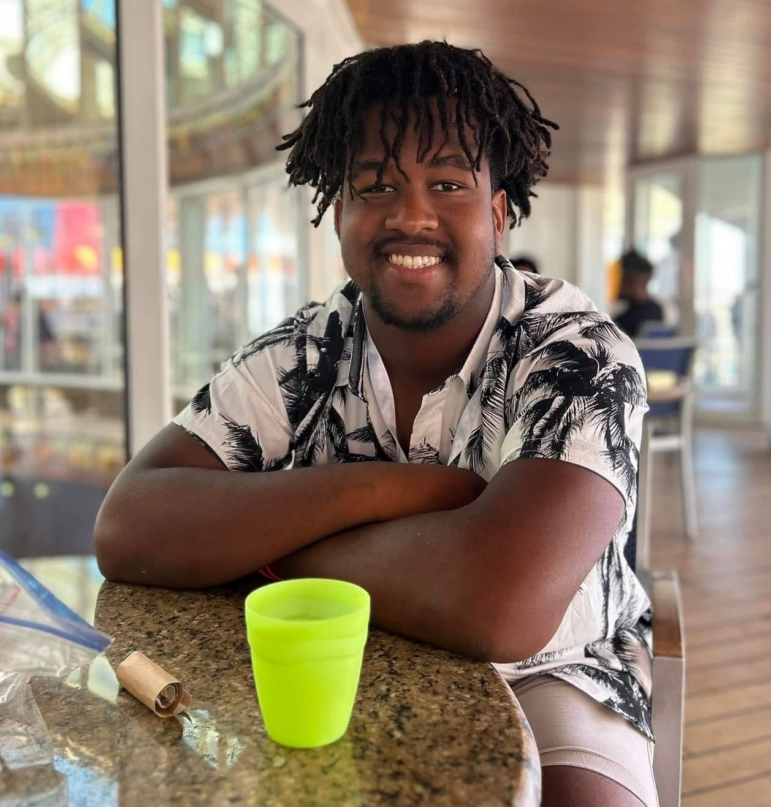 Calvin "CJ" Dickey Jr. is seen on a cruise with his family in 2023.