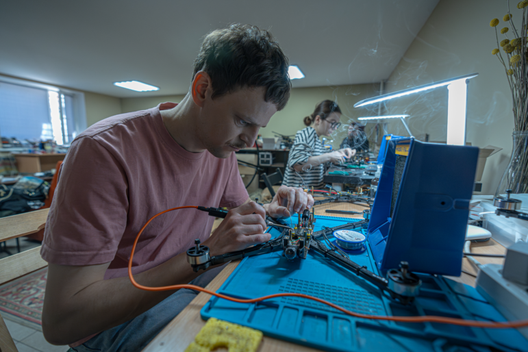 Oleh Halaidych, 34, scientist, documentary filmmaker, volunteer solder fpv dron in workshop in Kyiv on March 21, 2025