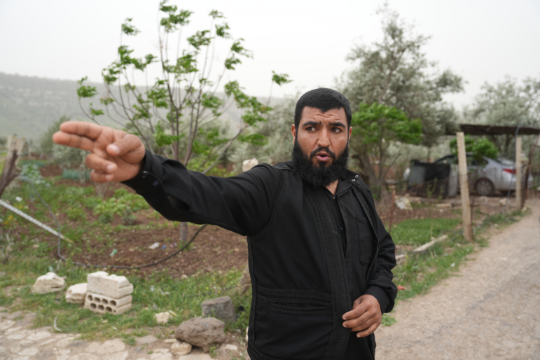Abdul Rahman Hamdan, 32, recounts how his uncle was killed by Israeli troops who attacked their village of Koayiah, Syria.