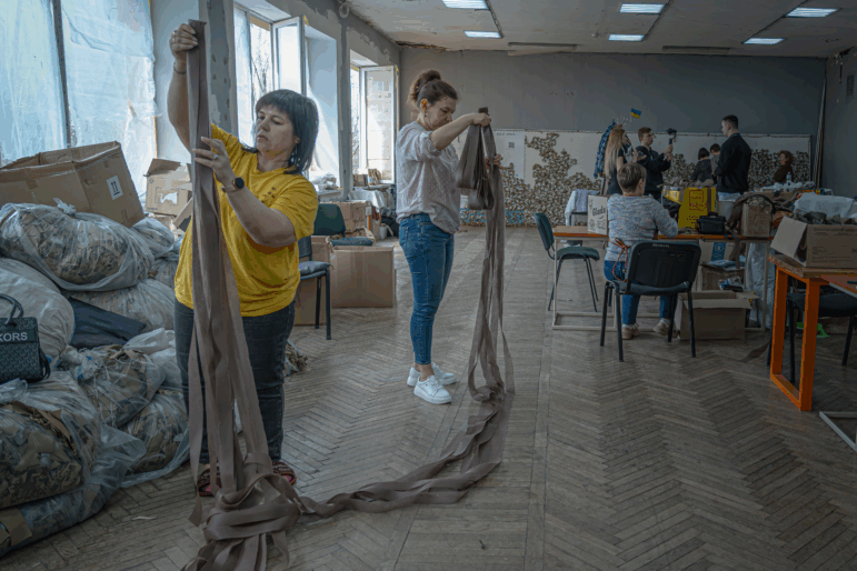 Mostly IDP women in Youth Center of Zaporizhia making camouflage netting in Zaporizhia Youth Center on March 19, 2025.