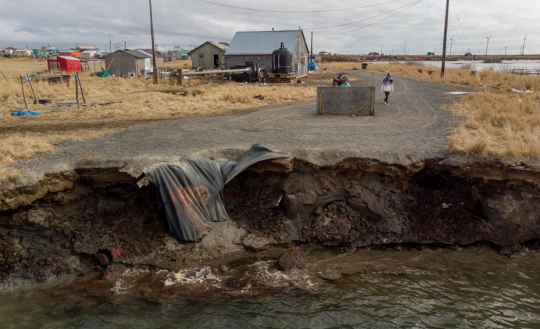 An aerial photo of the island village of Kivalina, an Alaska Native community of 500 people that's receding into the ocean as a result of rising sea levels.
