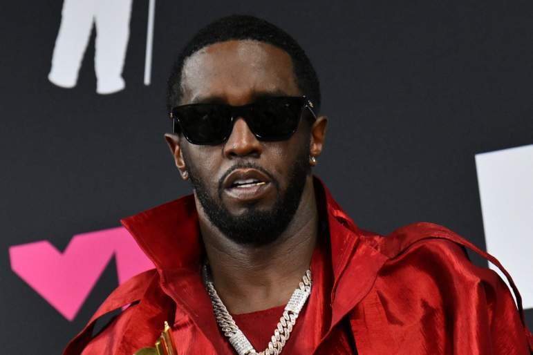 US producer-musician Sean "Diddy" Combs poses with the Global Icon award in the press room during the MTV Video Music Awards at the Prudential Center in Newark, New Jersey, on September 12, 2023.