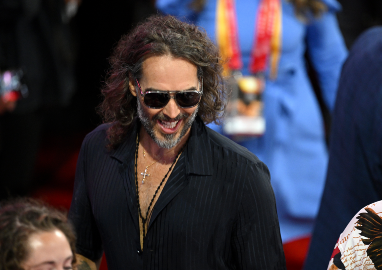 Comedian and actor Russell Brand is facing criminal charges in England over rape and sexual assault allegations that span some six years. He's seen here attending the Republican National Convention in July.