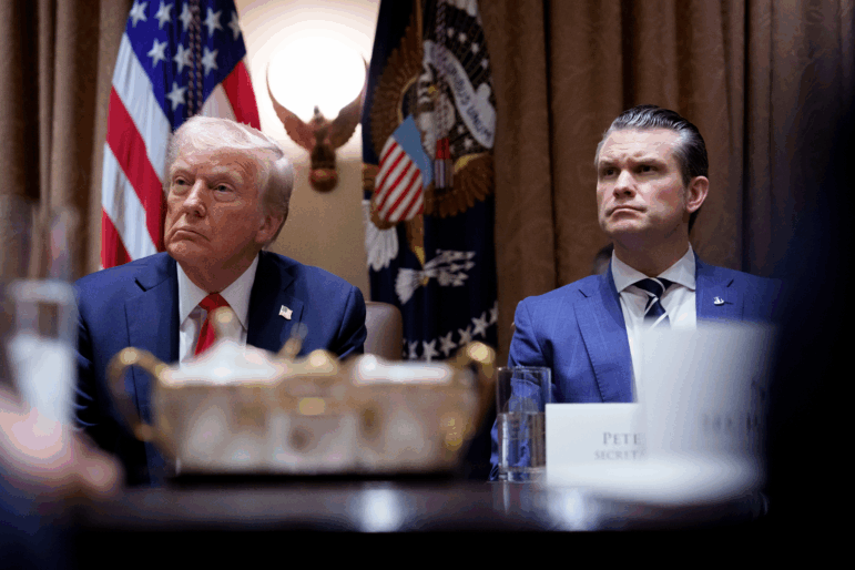 President Trump and Defense Secretary Pete Hegseth appear during a Cabinet meeting at the White House on Feb. 26.
